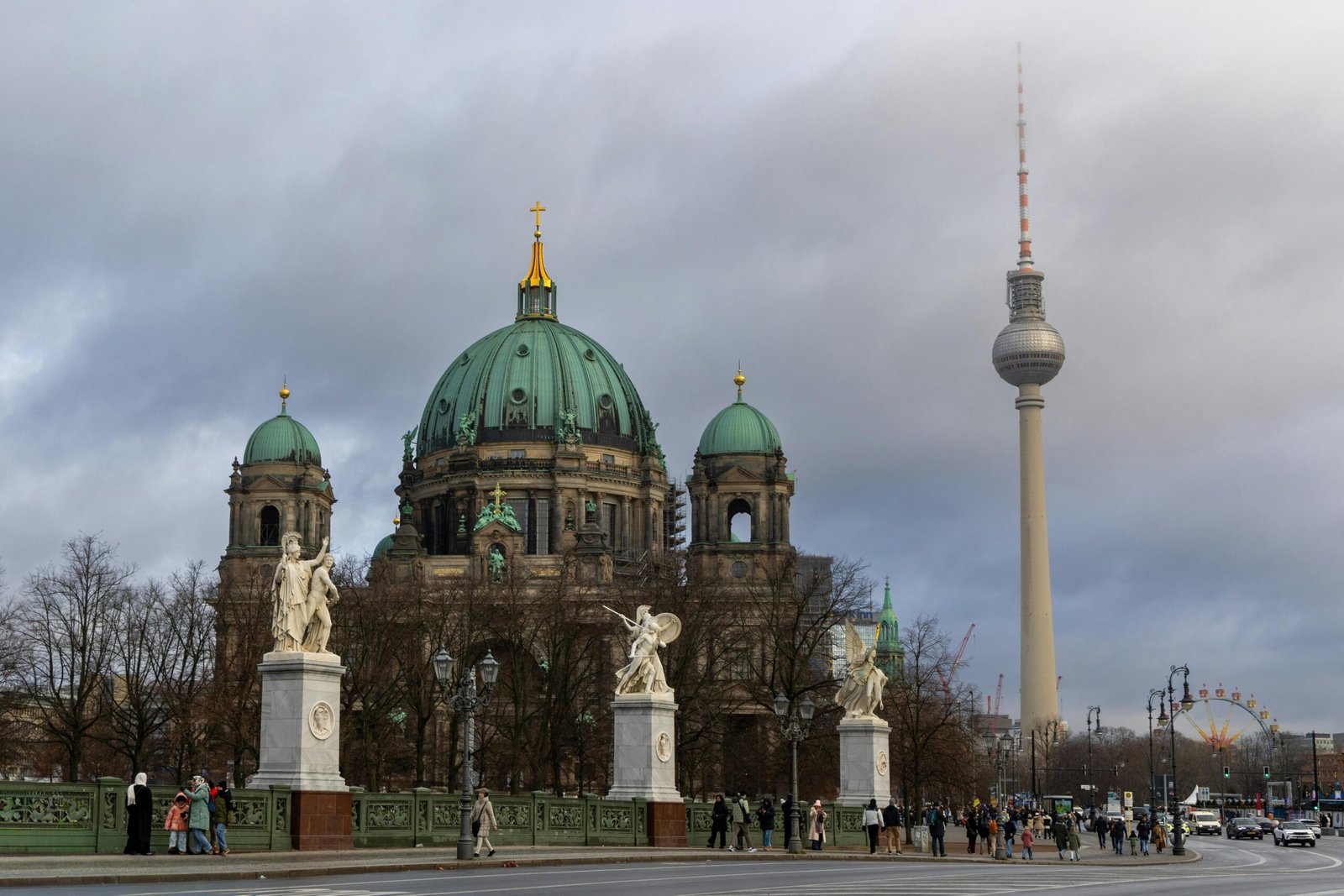View of Berlin Cathedral with the TV Tower in the background, showcasing Berlin's iconic architecture.